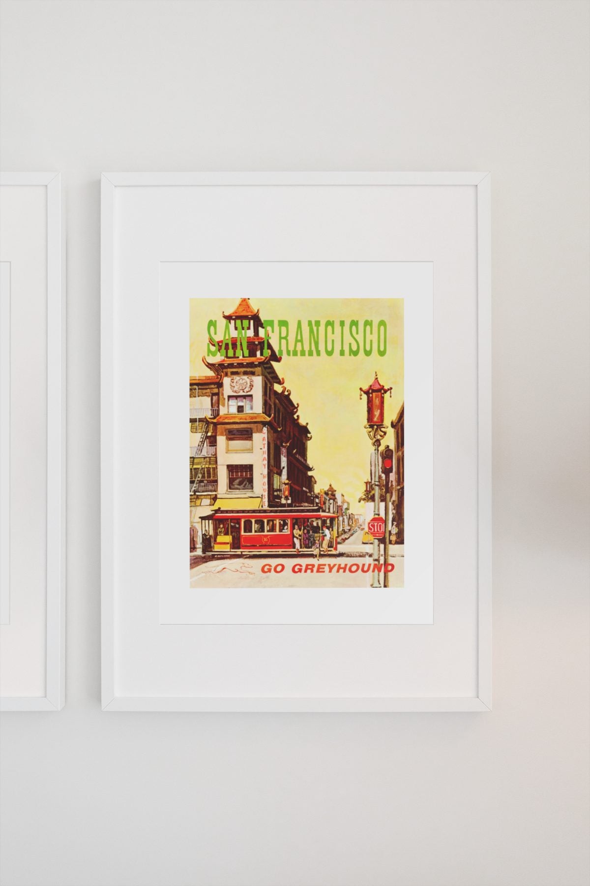 San Francisco Go Greyhound poster on a light wall