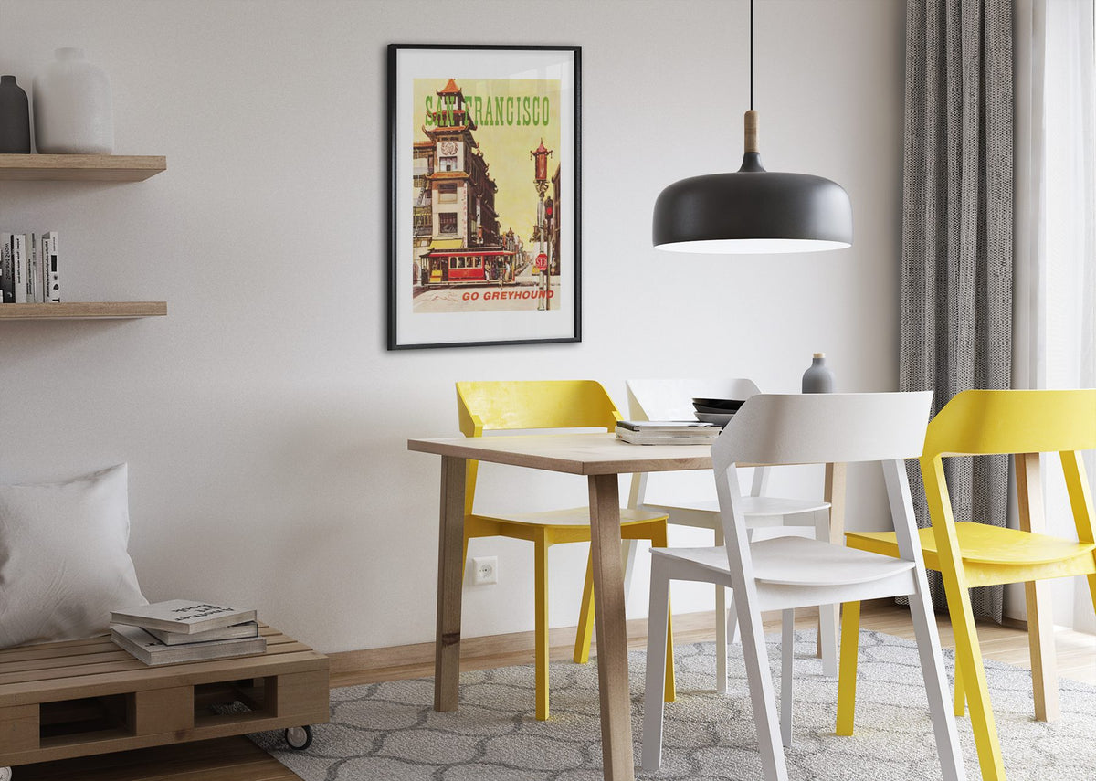 San Francisco Go Greyhound poster framed above a dining table