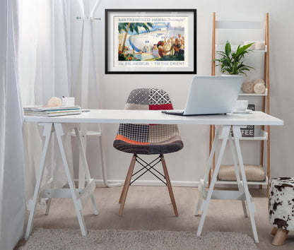 San Francisco to Hawaii Pan American poster framed above a white desk in a home office