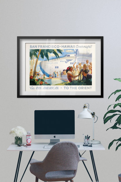 San Francisco to Hawaii Pan American poster framed on a grey wall above a desk