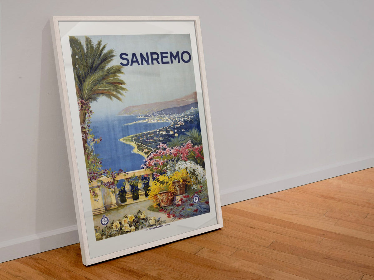 Sanremo — Italian Riviera poster in a white frame leaning against a wall