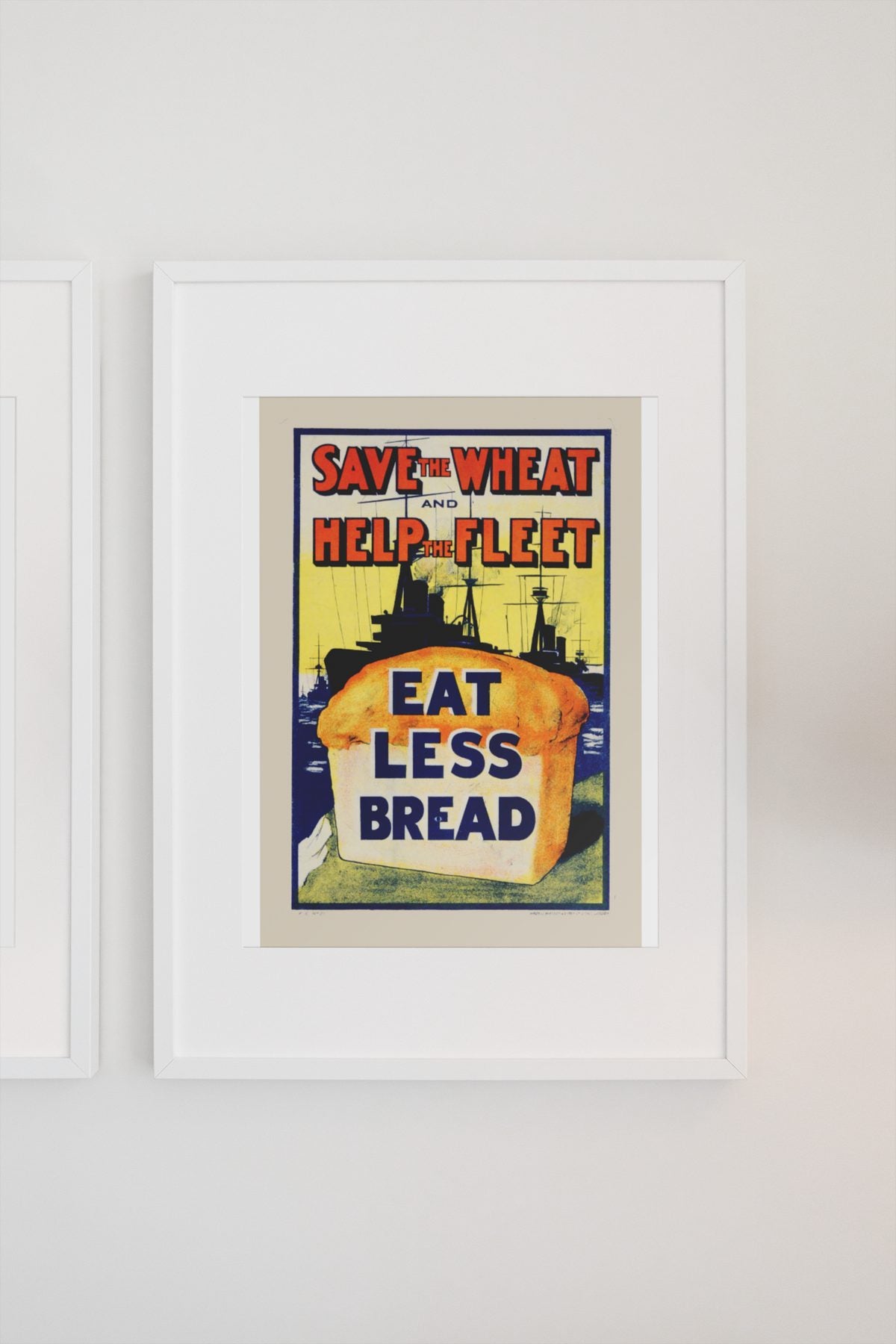 Save the Wheat Help the Fleet Eat Less Bread poster on a light wall