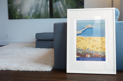 Scheveningen Holland poster leaning beside a blue sofa