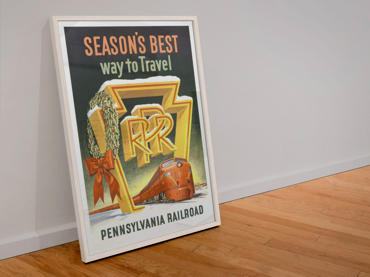 Seasons Best Way to Travel PRR poster in a white frame leaning against a wall