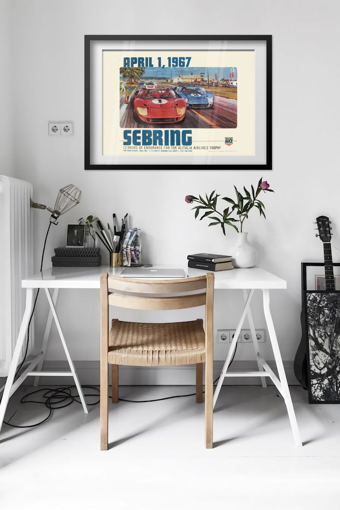 Sebring 12 Hours 1967 poster framed in a bright home office