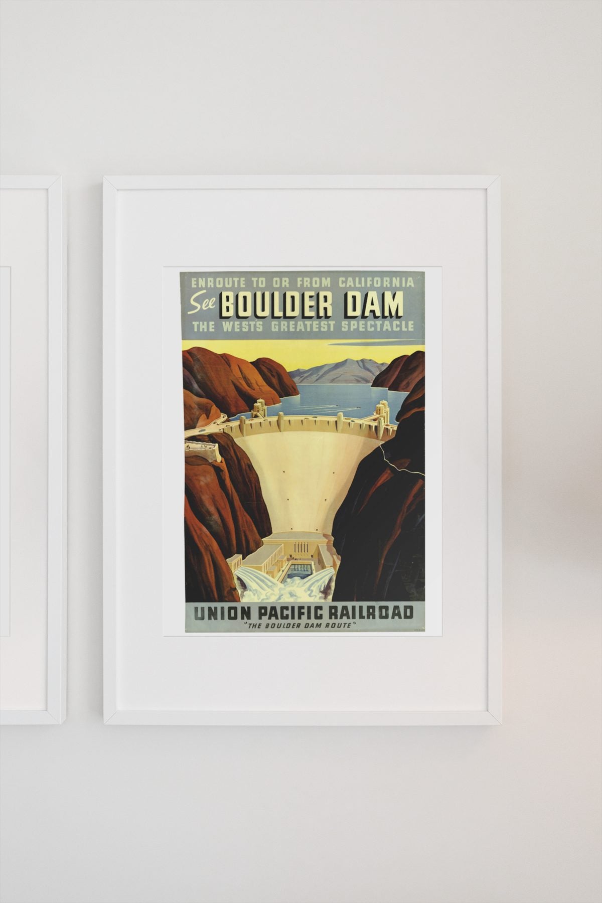 See Boulder Dam Union Pacific poster on a light wall