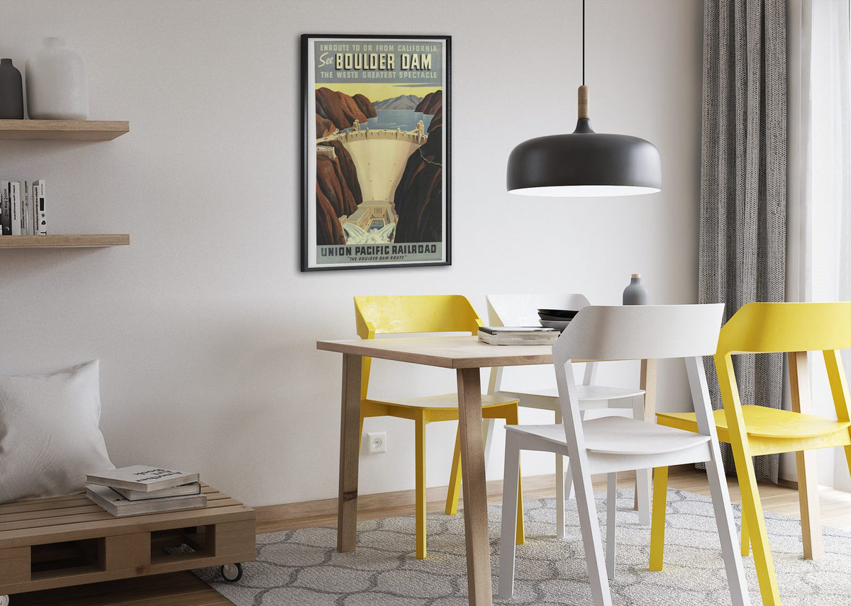See Boulder Dam Union Pacific poster framed above a dining table