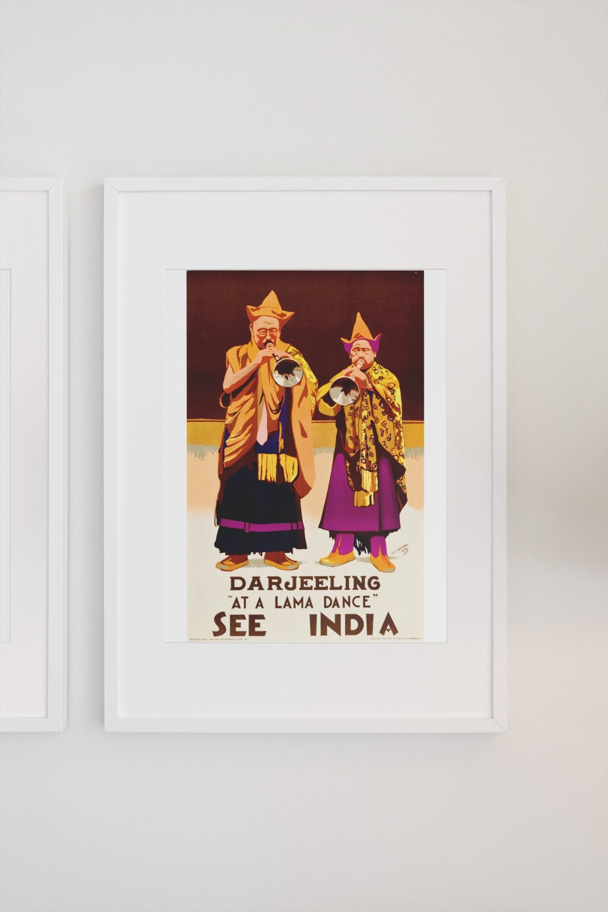 See India Darjeeling poster on a light wall