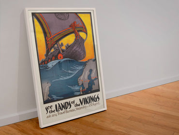 See the Lands of the Vikings poster in a white frame leaning against a wall