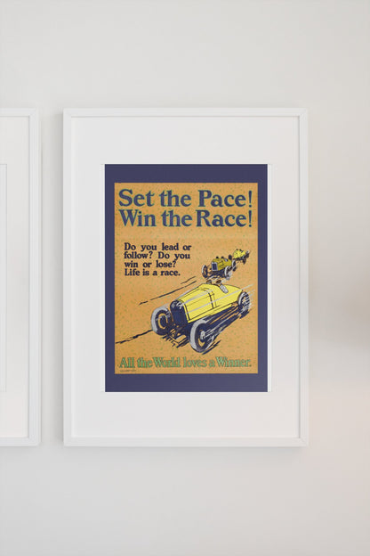 Set the Pace! Win the Race! poster in a white frame on a light wall
