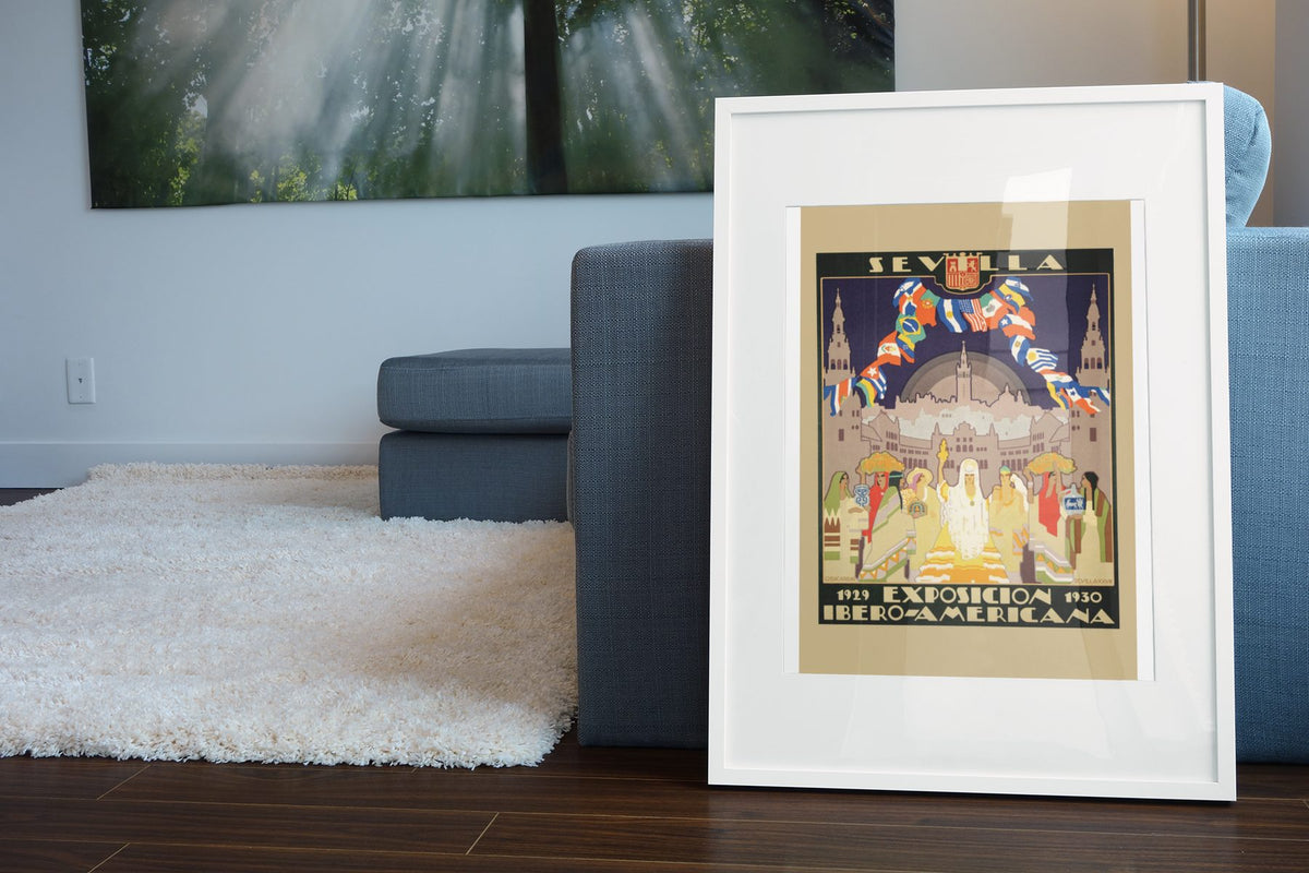 Sevilla Ibero American Exposition poster leaning beside a blue sofa