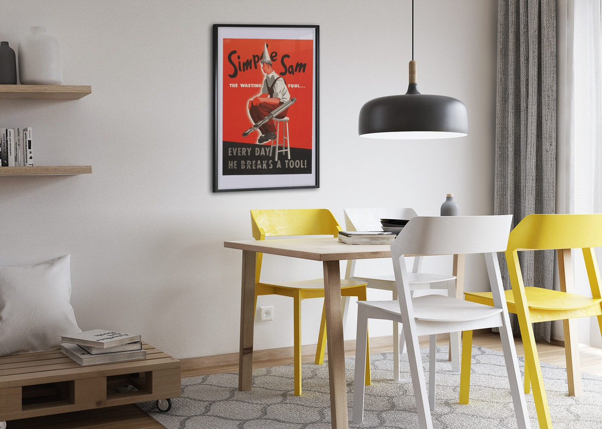 Simple Sam the Wasting Fool poster framed above a dining table