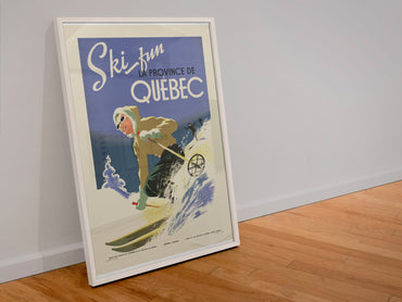 Ski Fun Quebec poster in a white frame leaning against a wall