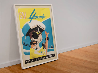 Ski in Yosemite poster in a white frame leaning against a wall