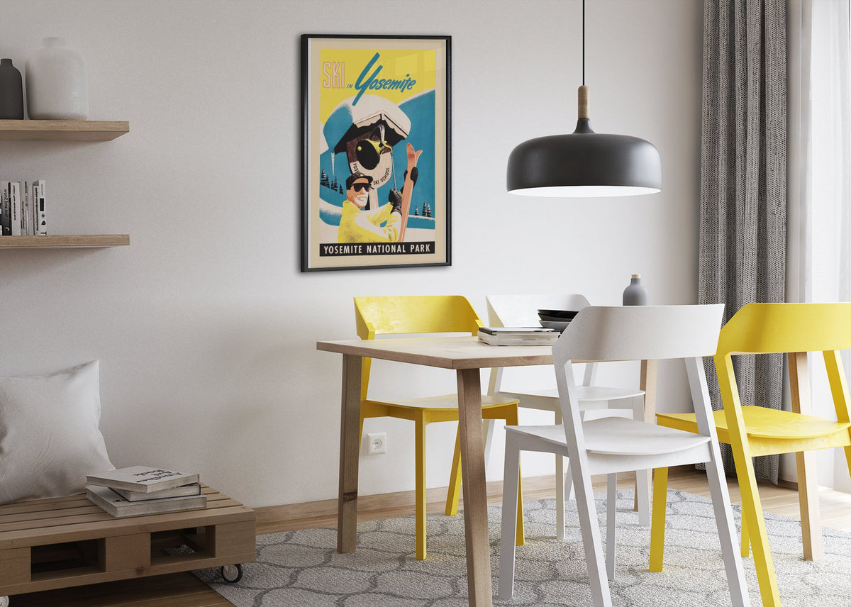 Ski in Yosemite poster framed above a dining table