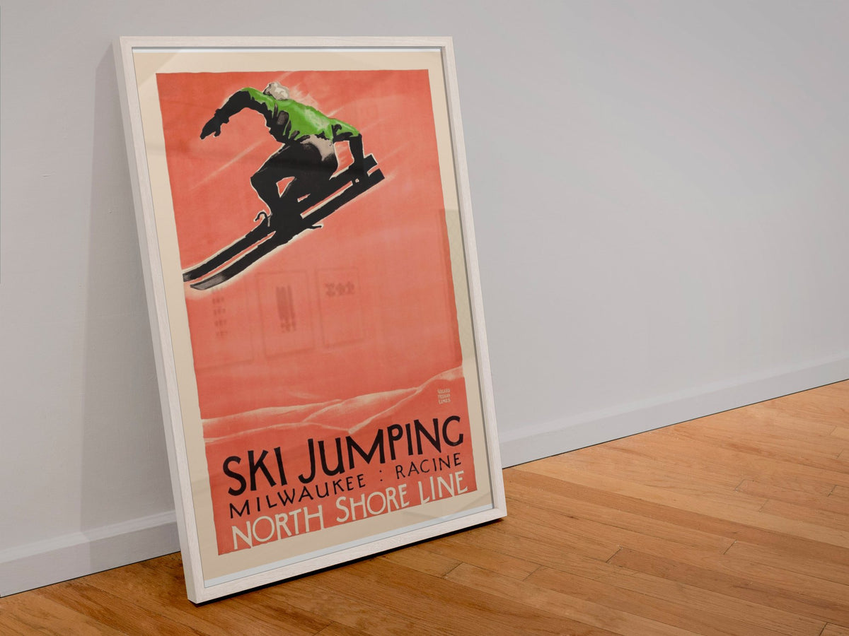 Ski Jumping North Shore Line poster in a white frame leaning against a wall
