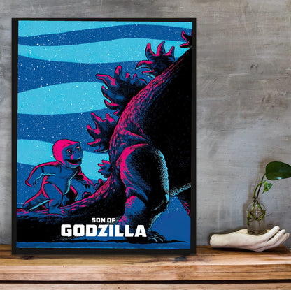 Son of Godzilla (1967) Movie Illustrated Art poster in a black frame on a wooden shelf against concrete