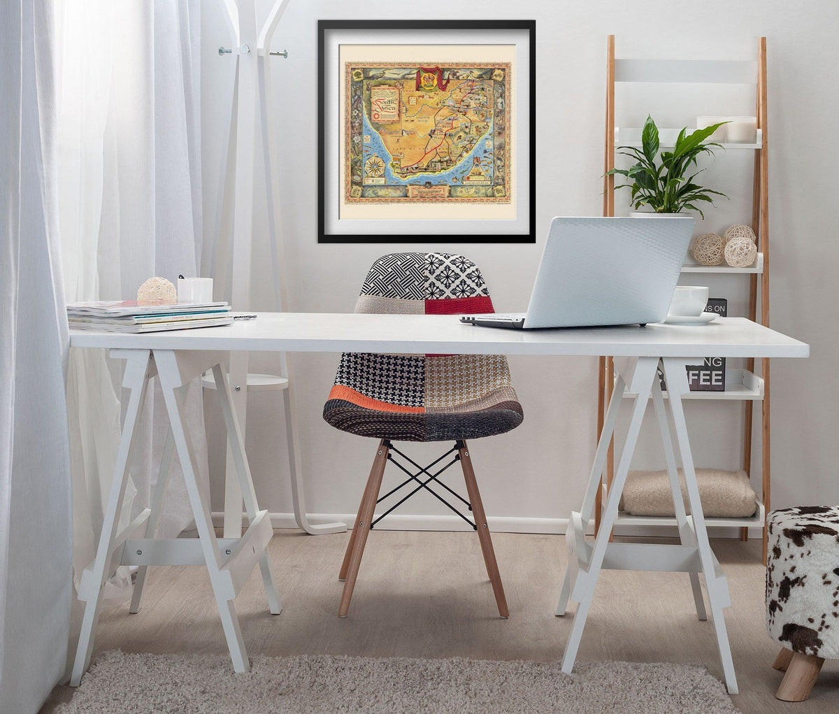 South Africa 1950s Illustrated Map print framed above a white desk in a home office