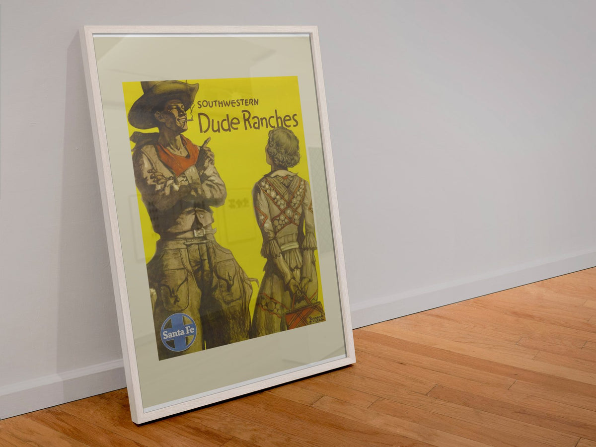 Southwestern Dude Ranches Santa Fe poster in a white frame leaning against a wall