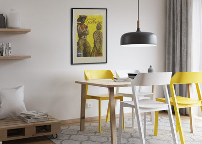 Southwestern Dude Ranches Santa Fe poster framed above a dining table