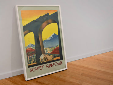 Soviet Armenia poster in a white frame leaning against a wall