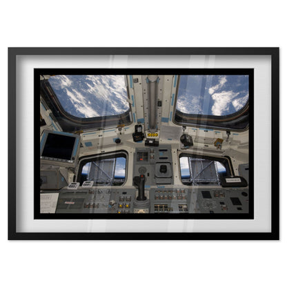 Space Shuttle Atlantis cockpit poster in a black frame