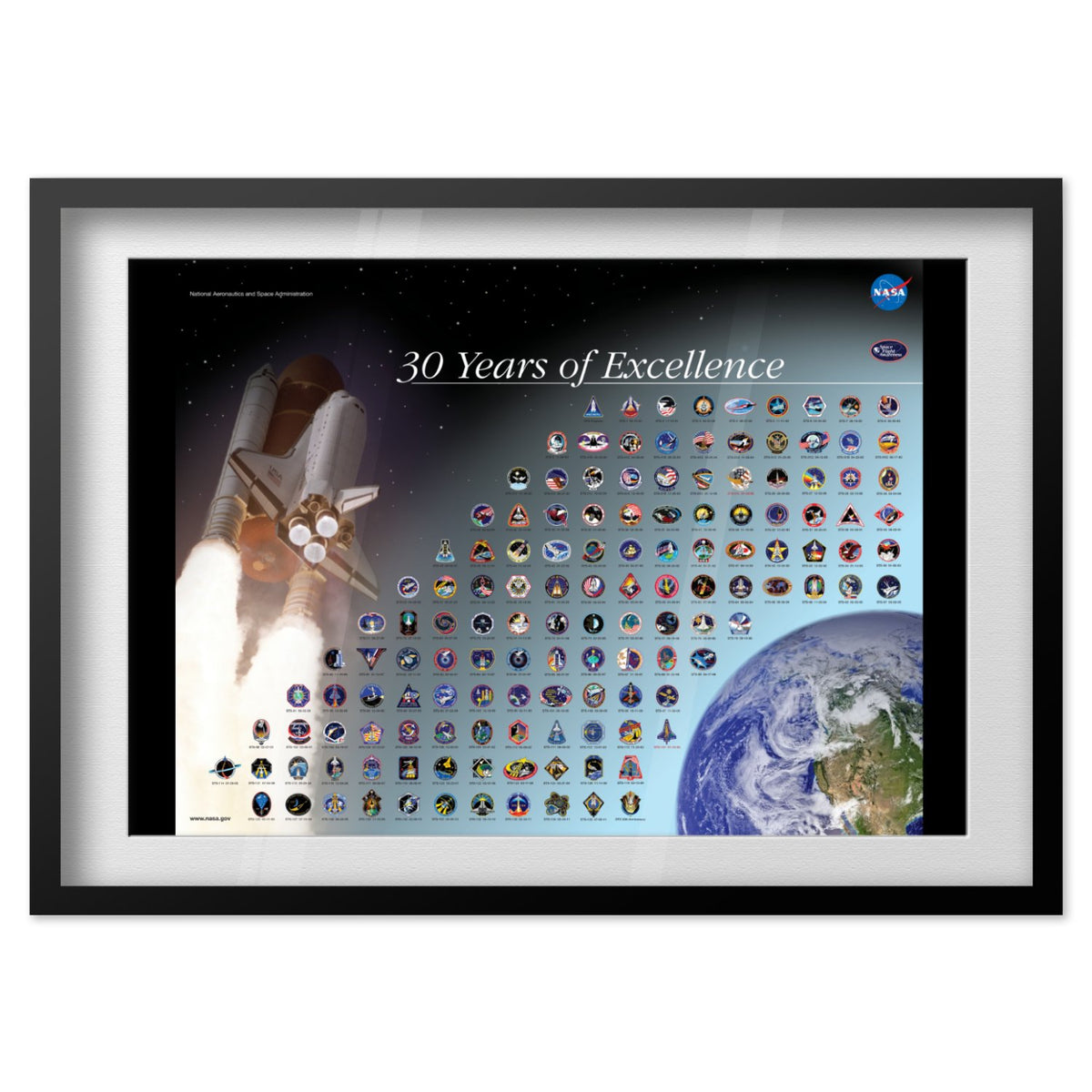 Space Shuttle mission patches, 30 Years of Excellence poster in a black frame