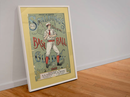 Spalding Base Ball Guide 1889 poster in a white frame leaning against a wall