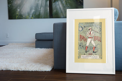 Spalding Base Ball Guide 1889 poster leaning beside a blue sofa
