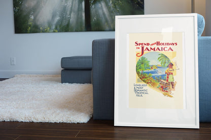 Spend Your Holidays in Jamaica poster leaning beside a blue sofa