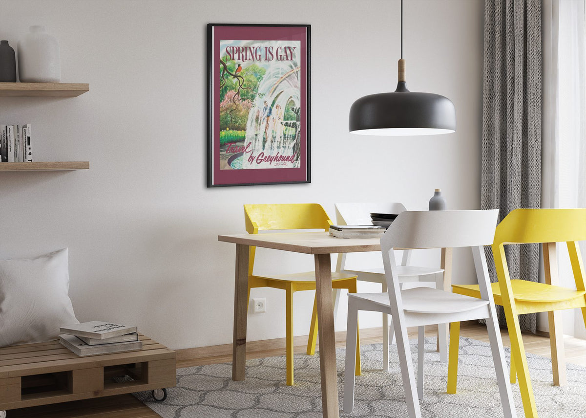 Spring is Gay Greyhound poster framed above a dining table