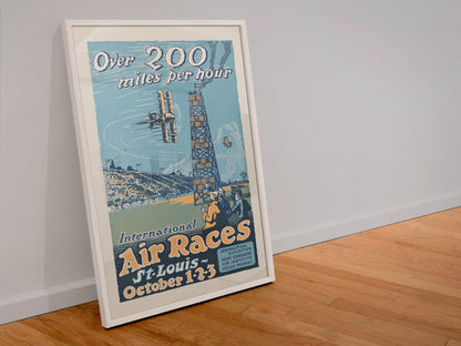 St Louis International Air Races poster in a white frame leaning against a wall