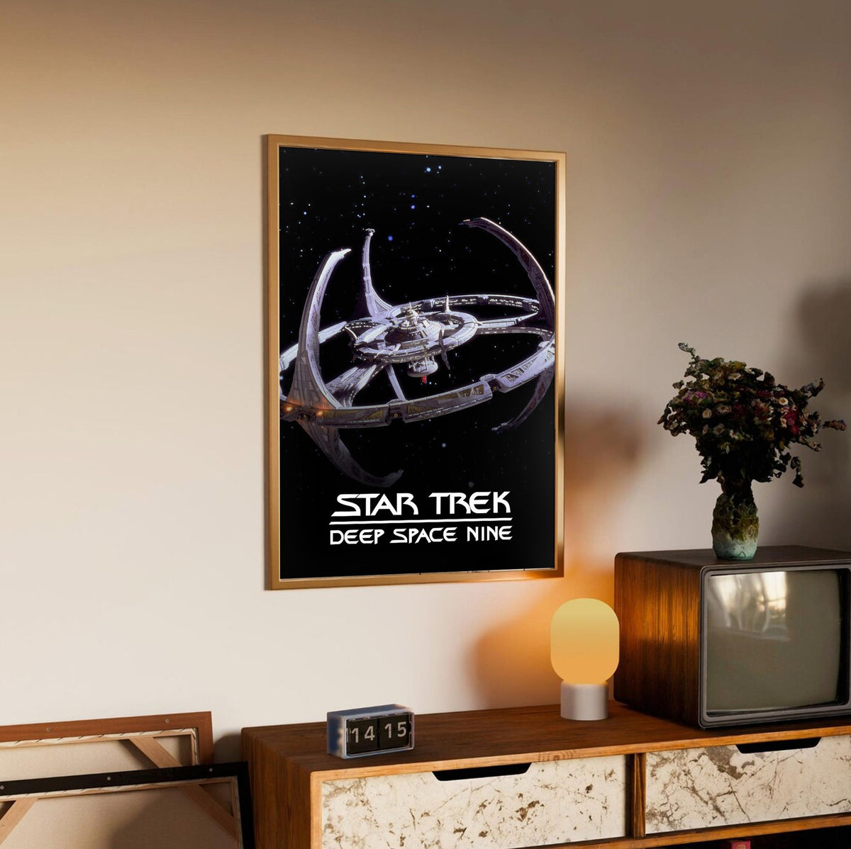 Star Trek: Deep Space Nine poster in an oak frame above a sideboard
