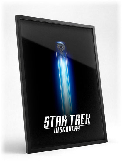 Star Trek: Discovery poster in a black frame with glass leaning against a wall
