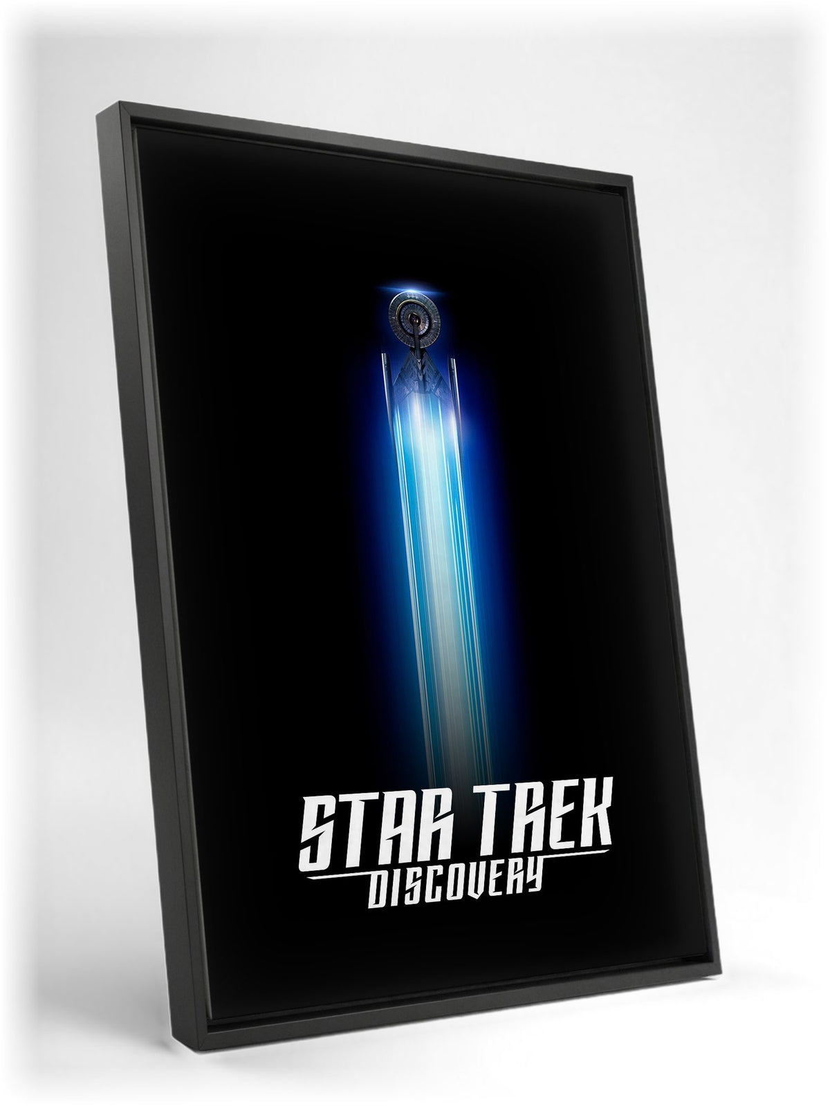 Star Trek: Discovery as a black floater framed canvas leaning against a wall