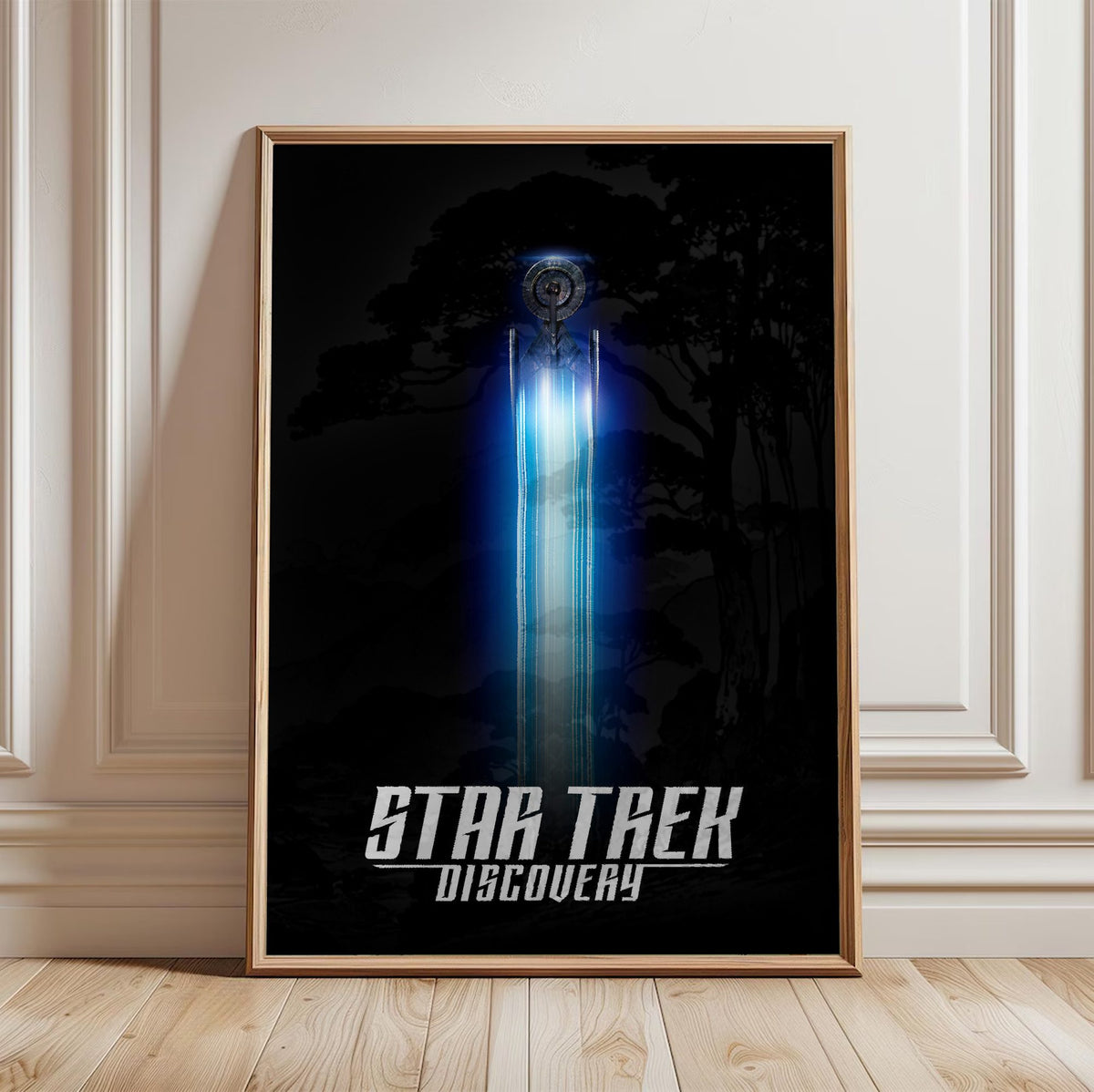Star Trek: Discovery poster in a light oak frame leaning against a white wall