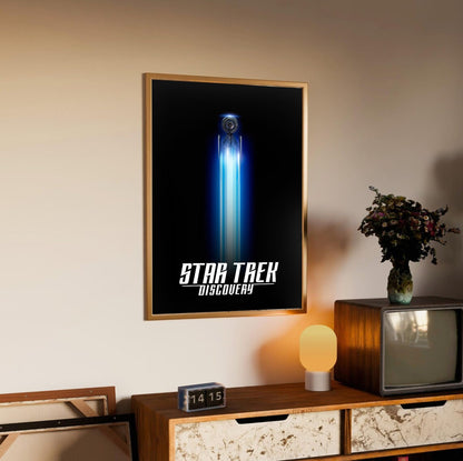 Star Trek: Discovery poster in an oak frame above a sideboard