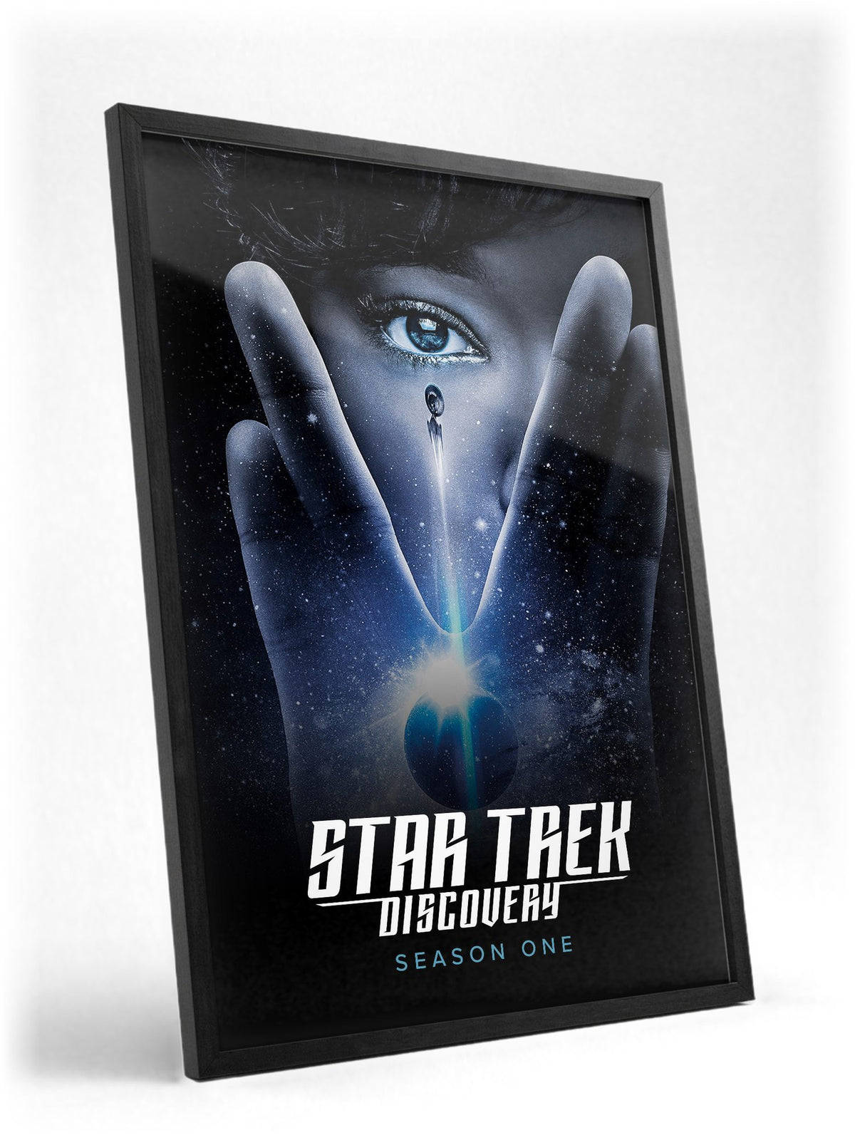 Star Trek: Discovery poster in a black frame with glass leaning against a wall