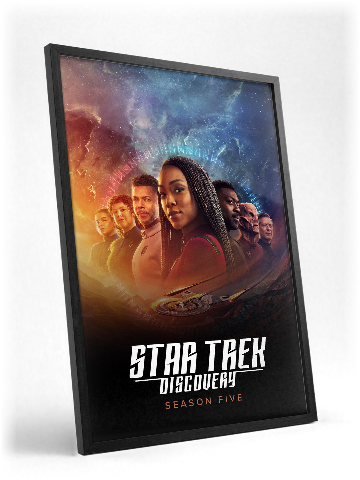 Star Trek: Discovery poster in a black frame with glass leaning against a wall