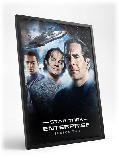 Star Trek: Enterprise poster in a black frame with glass leaning against a wall