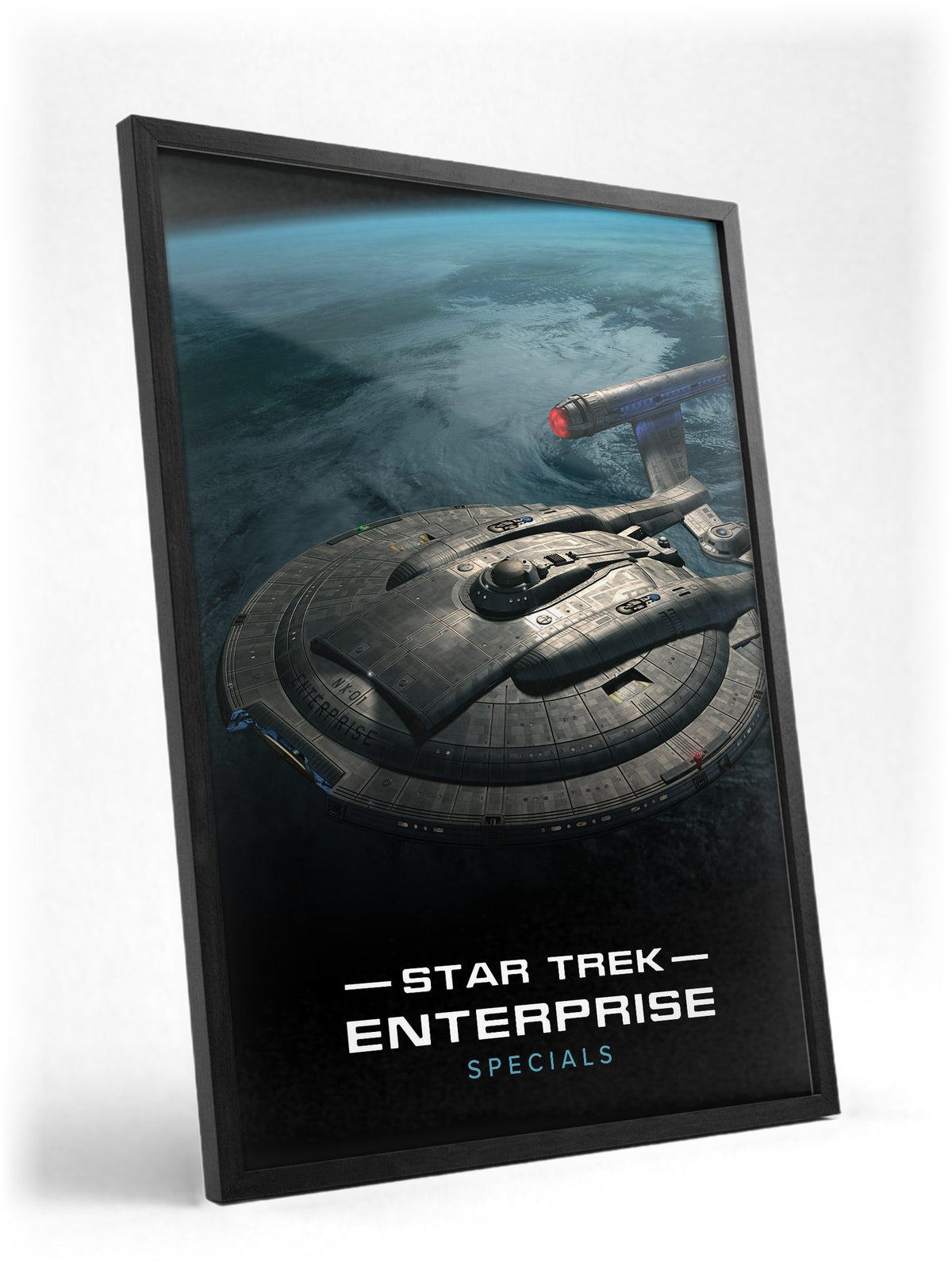 Star Trek: Enterprise poster in a black frame with glass leaning against a wall