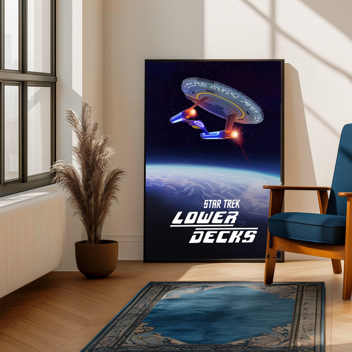 Star Trek: Lower Decks poster framed beside a blue armchair in a sunlit room