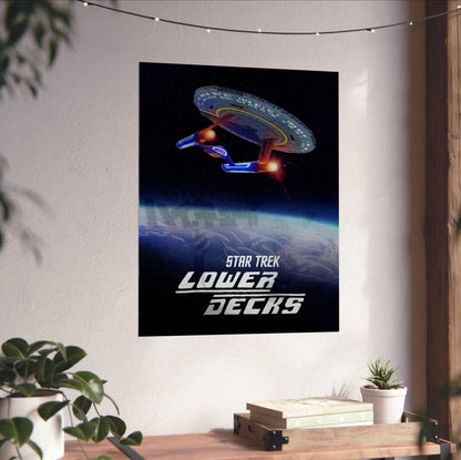 Star Trek: Lower Decks poster unframed on a white wall above a desk