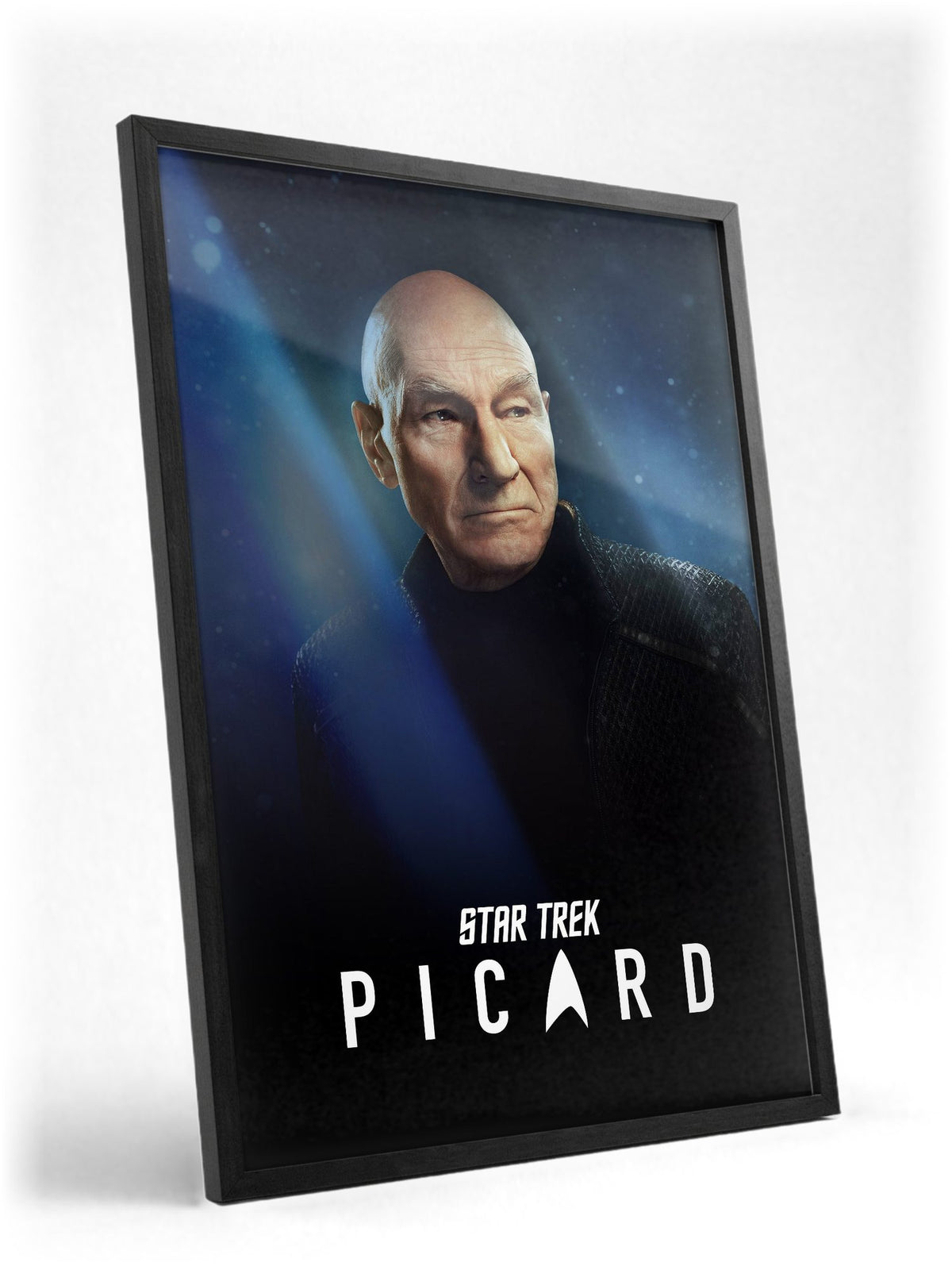 Star Trek: Picard poster in a black frame with glass leaning against a wall