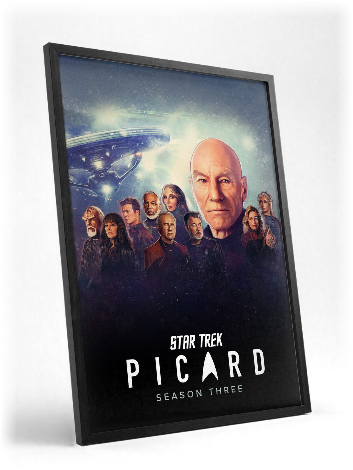 Star Trek: Picard poster in a black frame with glass leaning against a wall