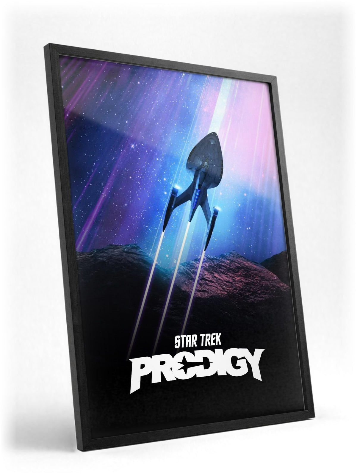Star Trek: Prodigy poster in a black frame with glass leaning against a wall