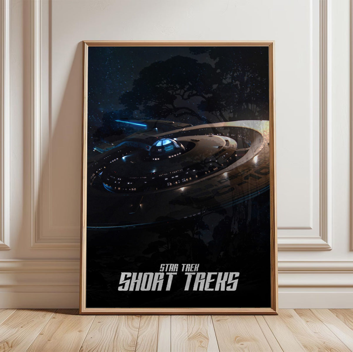 Star Trek: Short Treks poster in a light oak frame leaning against a white wall