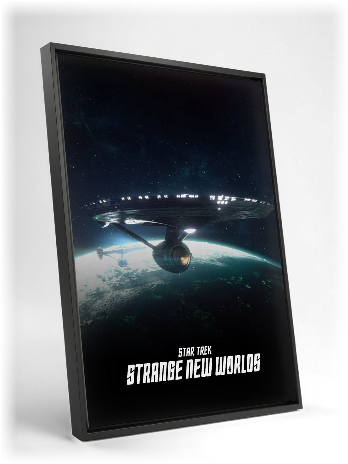 Star Trek: Strange New Worlds as a black floater framed canvas leaning against a wall