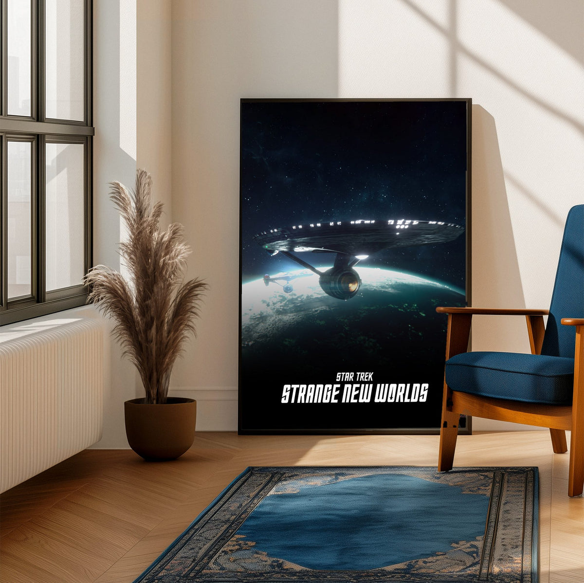 Star Trek: Strange New Worlds poster framed beside a blue armchair in a sunlit room