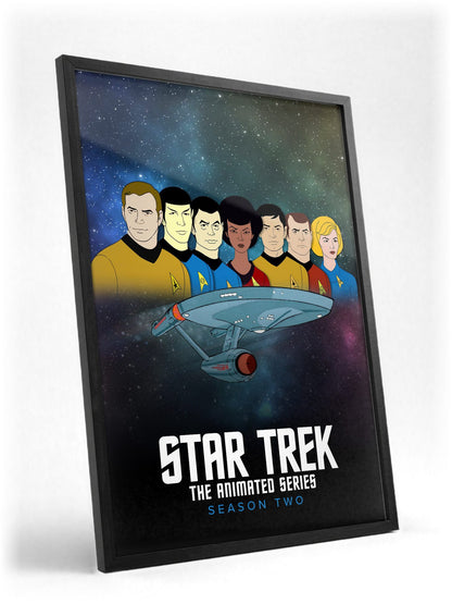 Star Trek: The Animated Series poster in a black frame with glass leaning against a wall